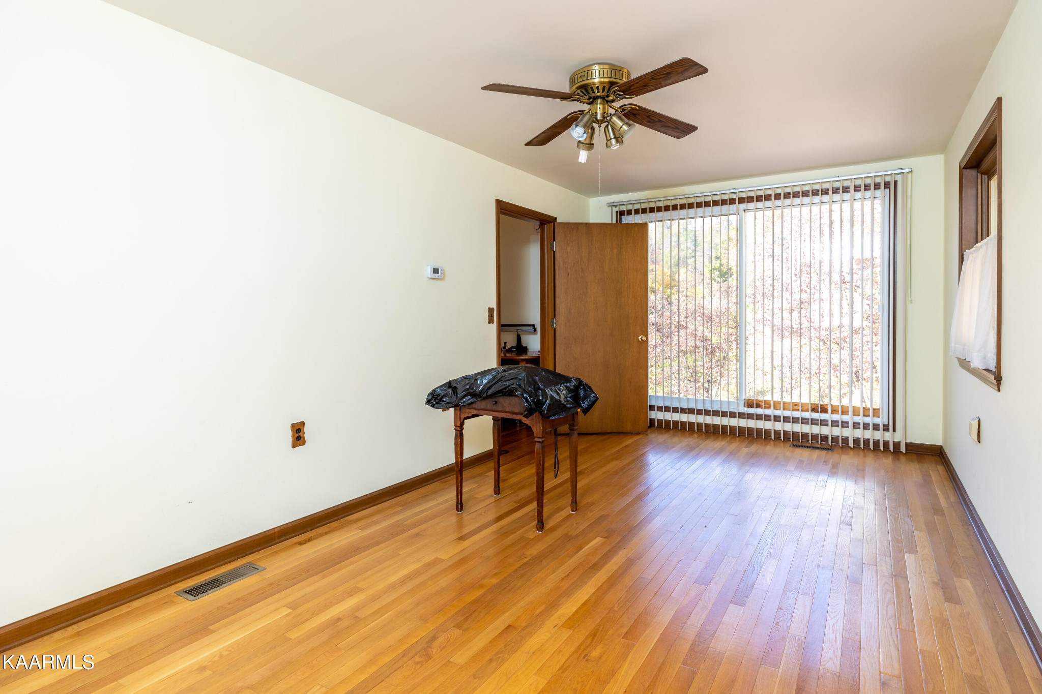 710 Scenic River Road Madisonville, TN 37354 - Photo 23 of 43 wooden floor in an empty room with a window