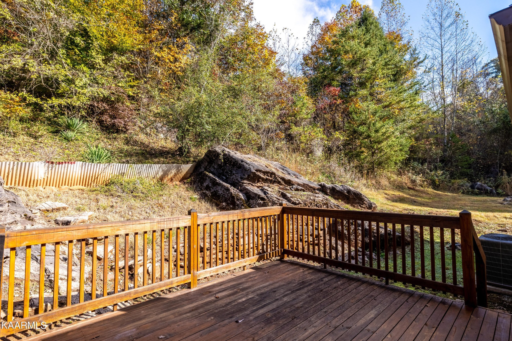 710 Scenic River Road Madisonville, TN 37354 - Photo 29 of 43 a view of a wooden roof deck
