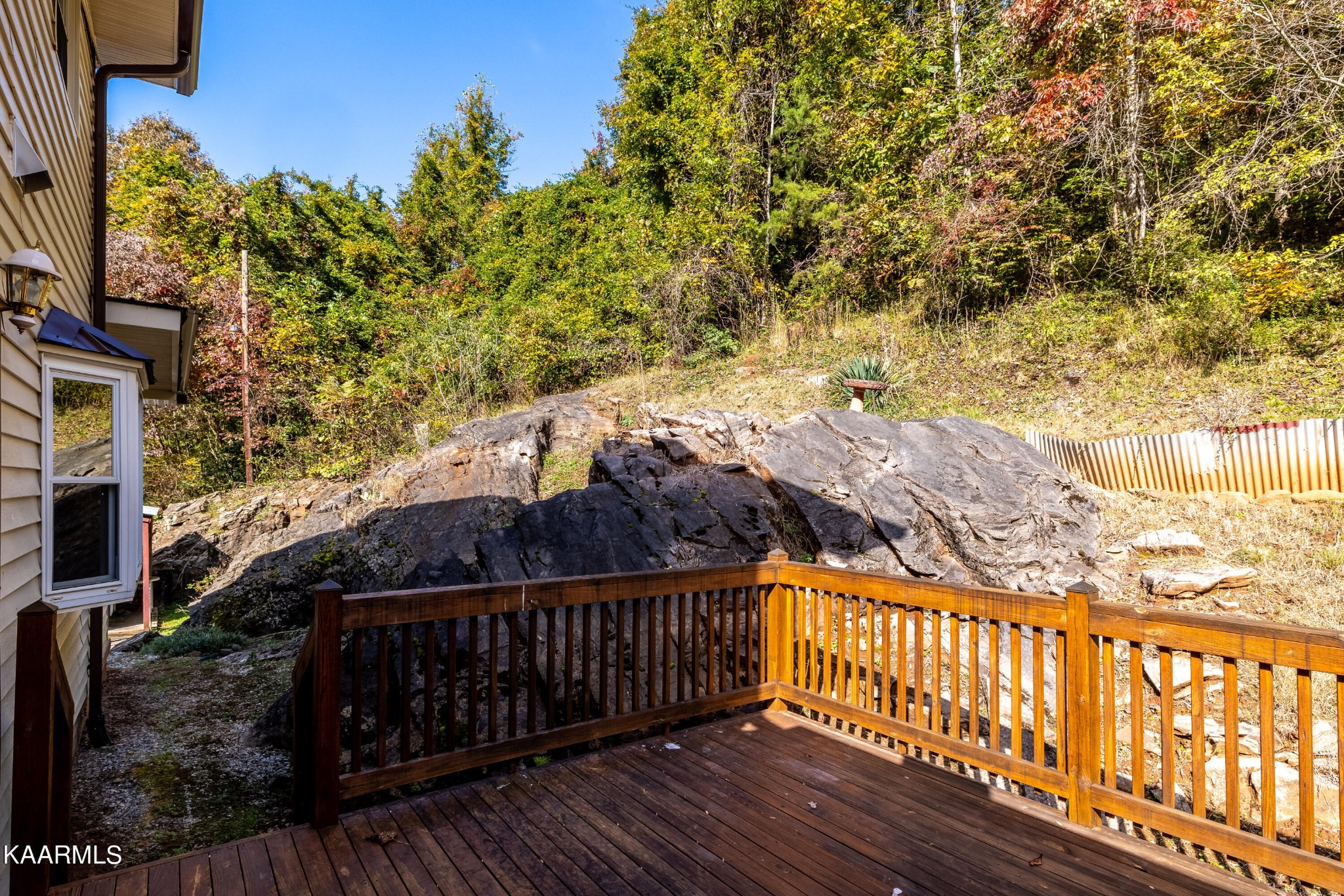 710 Scenic River Road Madisonville, TN 37354 - Photo 30 of 43 a view of street with wooden fence