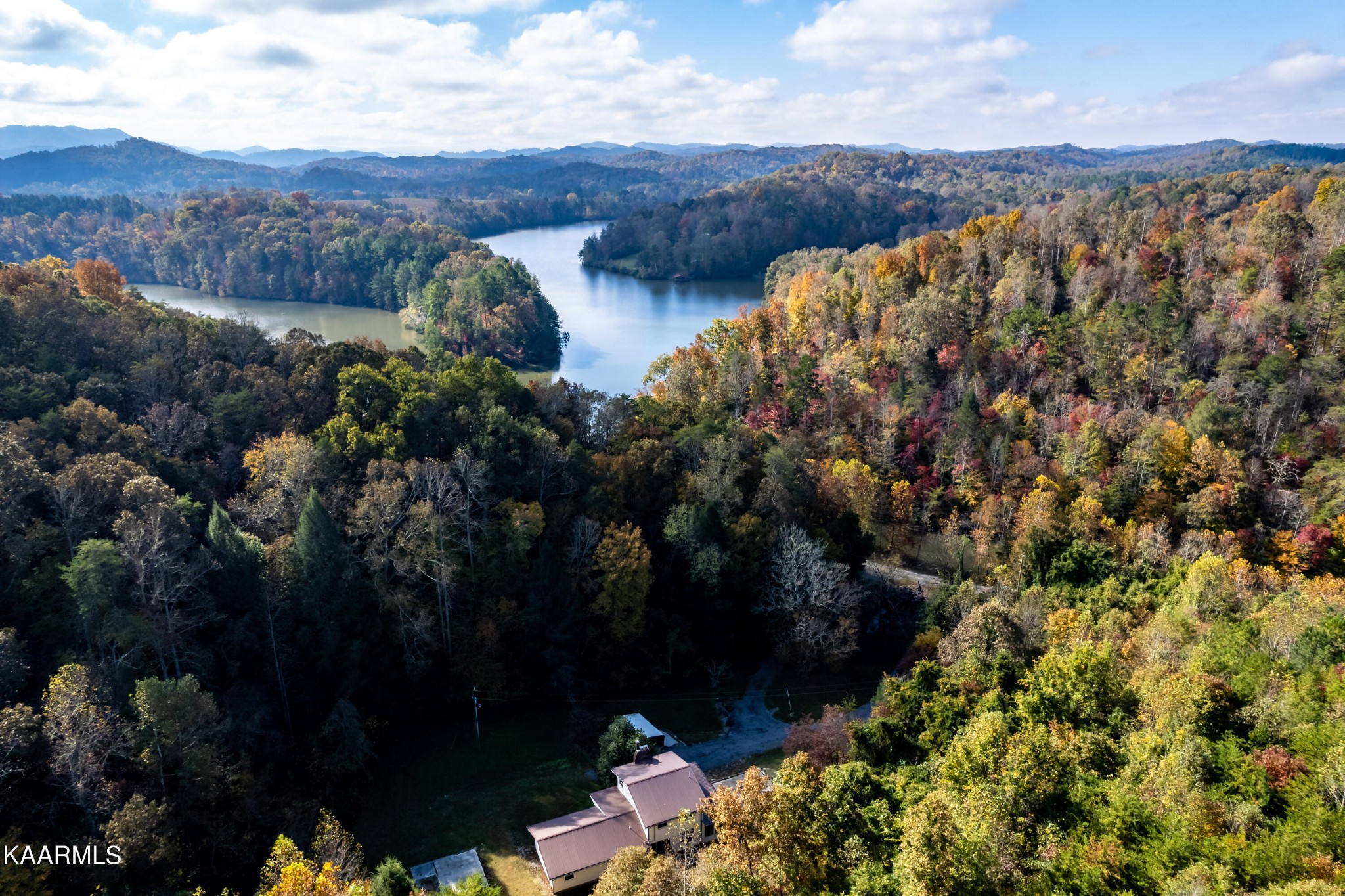 710 Scenic River Road Madisonville, TN 37354 - Photo 39 of 43 a view of a lot of trees and houses