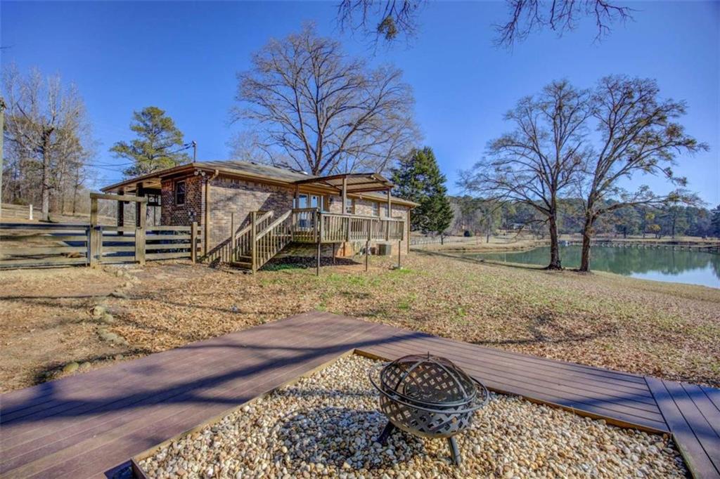 40 Spillers Lane Covington, GA 30014 - Photo 36 of 42 a view of a house with a yard covered with snow in front of it