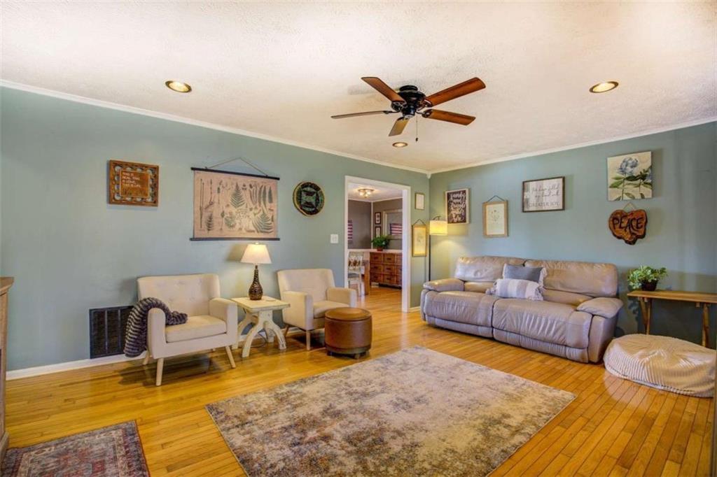 40 Spillers Lane Covington, GA 30014 - Photo 5 of 42 a living room with furniture wooden floor and a rug