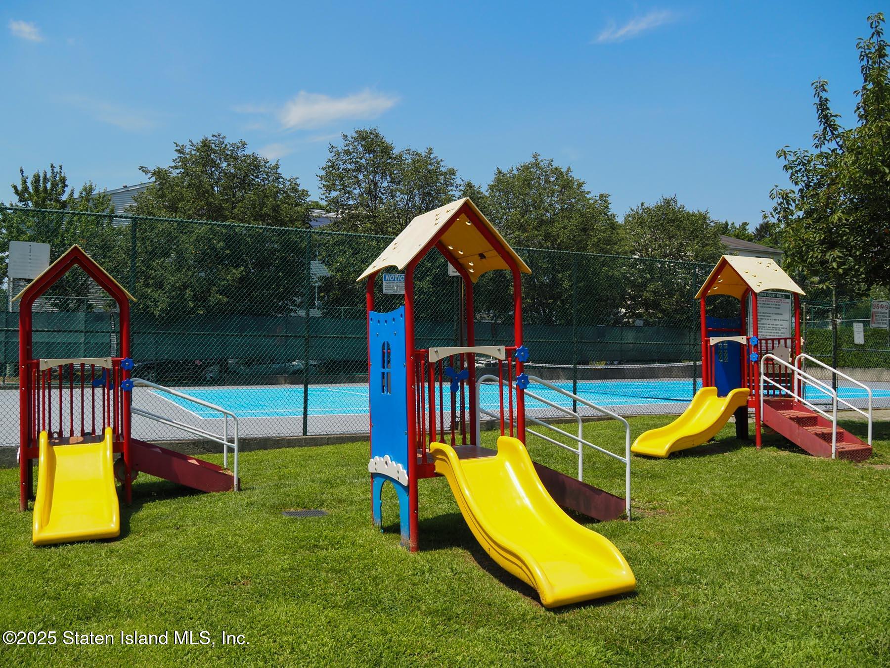 214 Ilyssa Way Staten Island, NY 10312 - Photo 13 of 22 a view of a swimming pool with a backyard and swimming pool