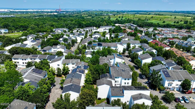 an aerial view of multiple house