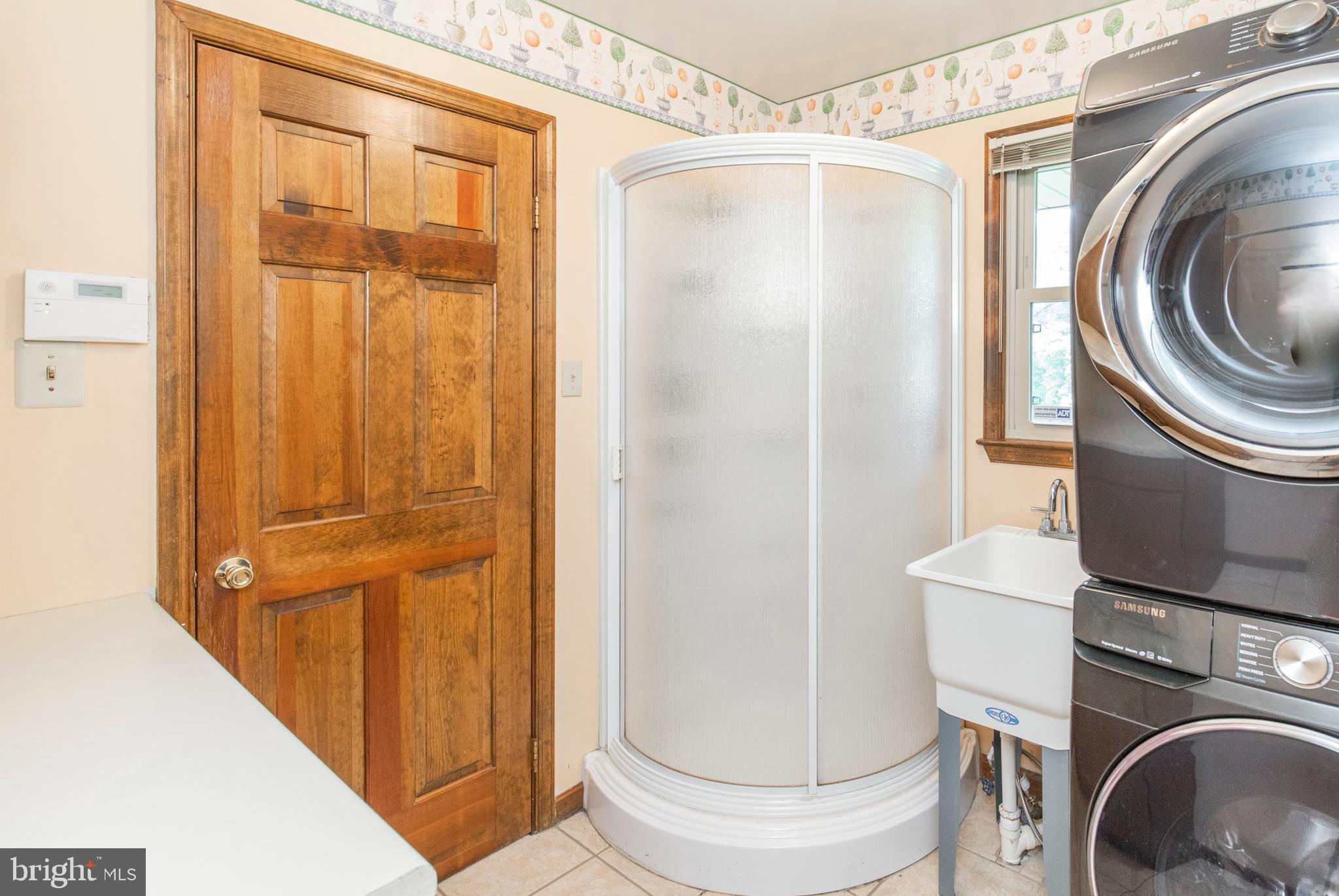 1370 Cold Spring Road Newtown Square, PA 19073 - Photo 20 of 47 Mud room, with stackable W/D and shower.