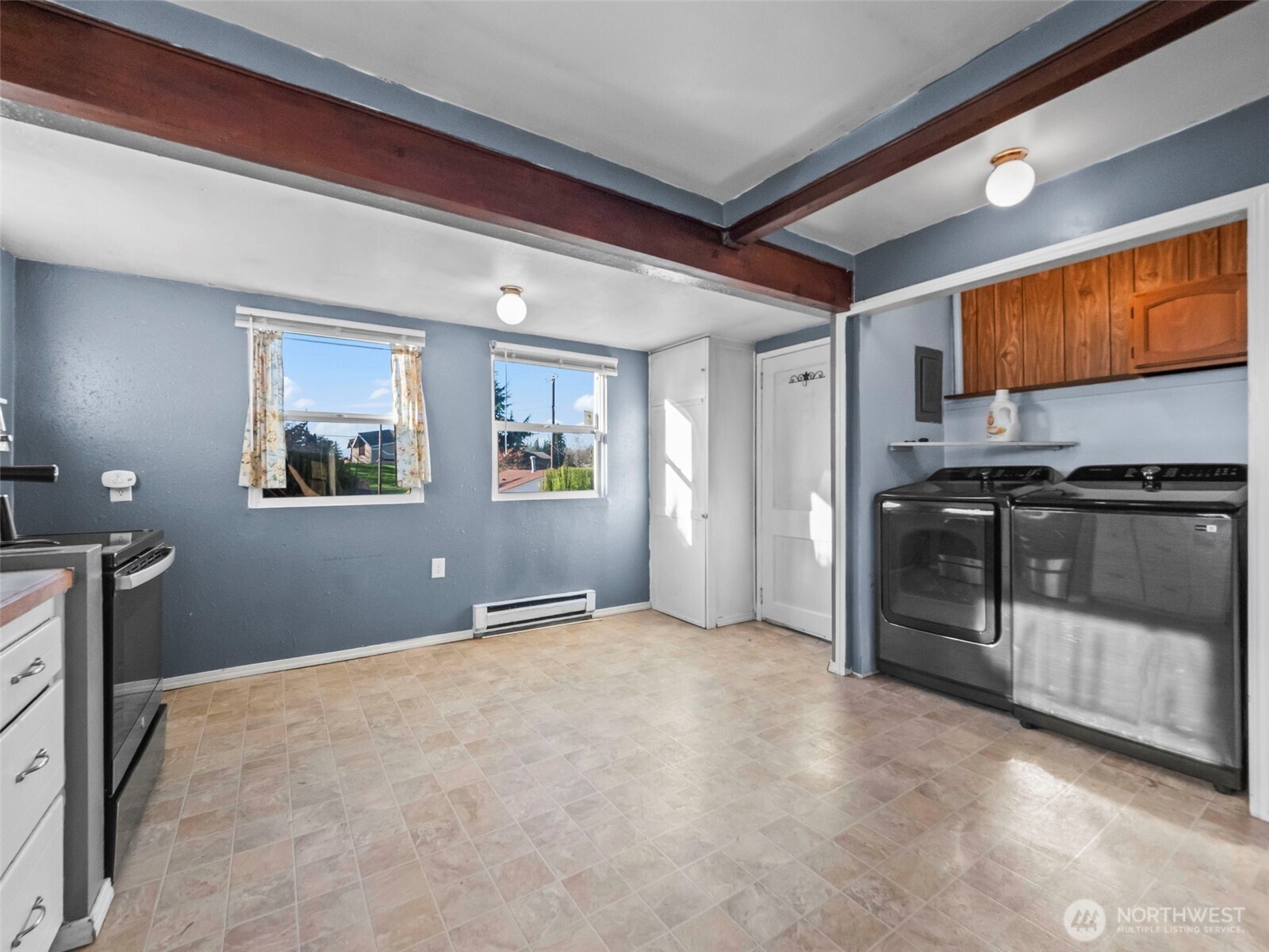 1022 Sheridan Road Bremerton, WA 98310 - Photo 14 of 28 a view of a kitchen with a sink cabinets and a window