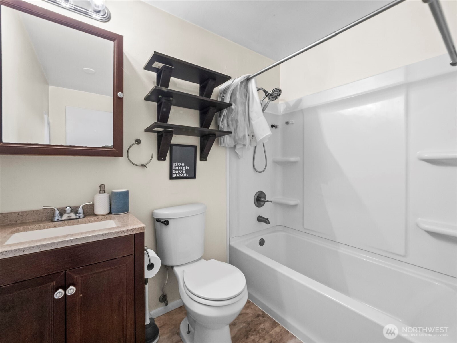 1022 Sheridan Road Bremerton, WA 98310 - Photo 20 of 28 a bathroom with a sink toilet and shower