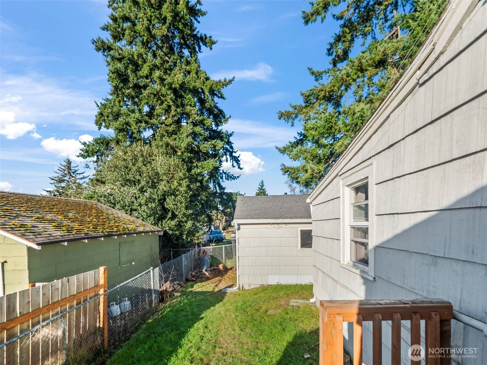 1022 Sheridan Road Bremerton, WA 98310 - Photo 21 of 28 a view of a house with backyard and garden