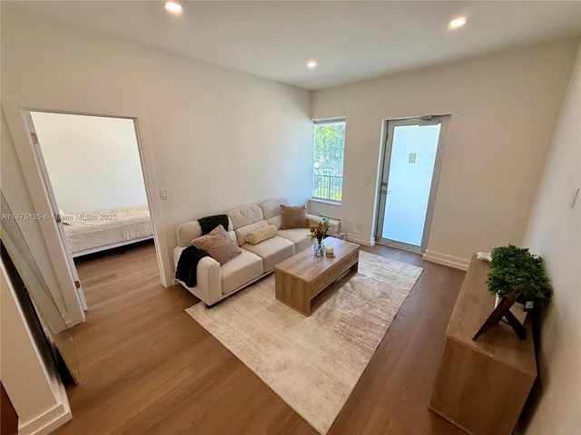 a living room with furniture and a couch