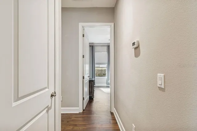 a room with a sink and cabinets