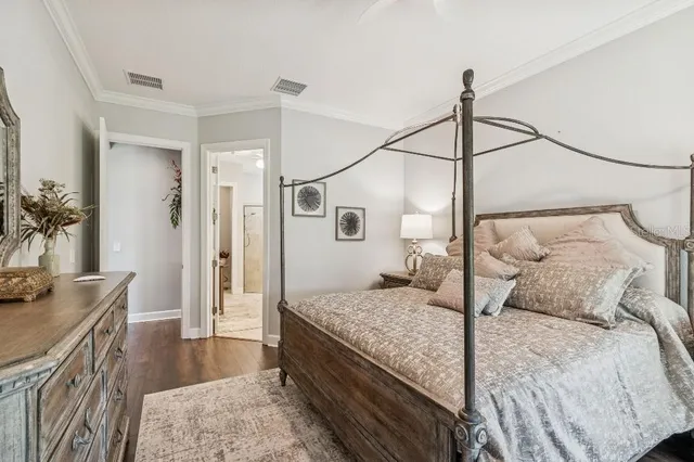 a spacious bathroom with a granite countertop sink a mirror and shower