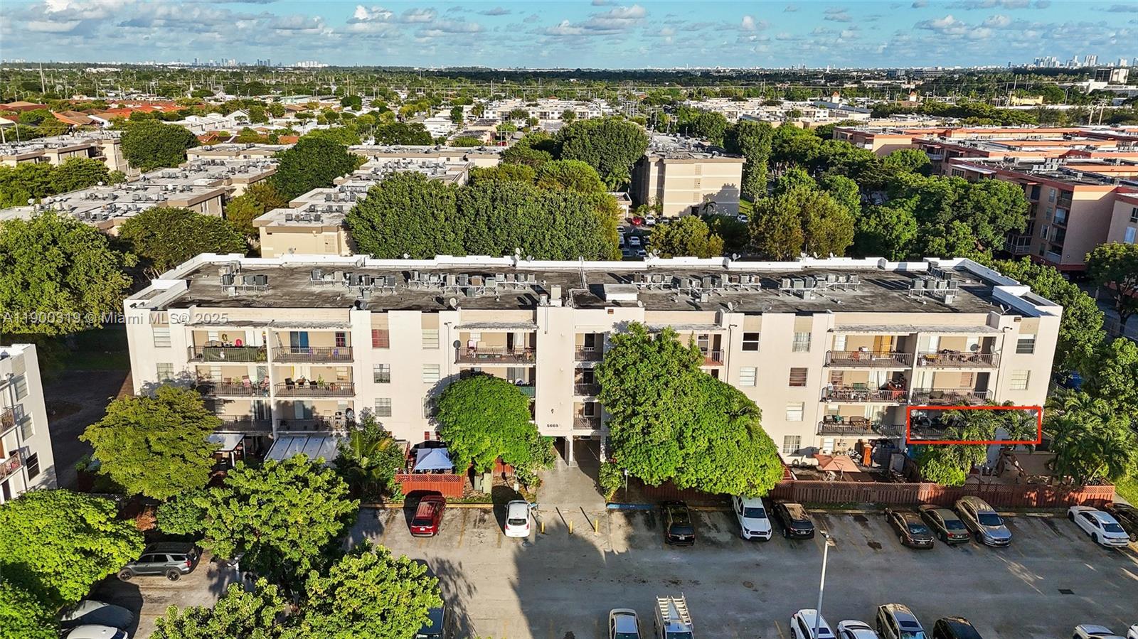 an aerial view of a building with outdoor space