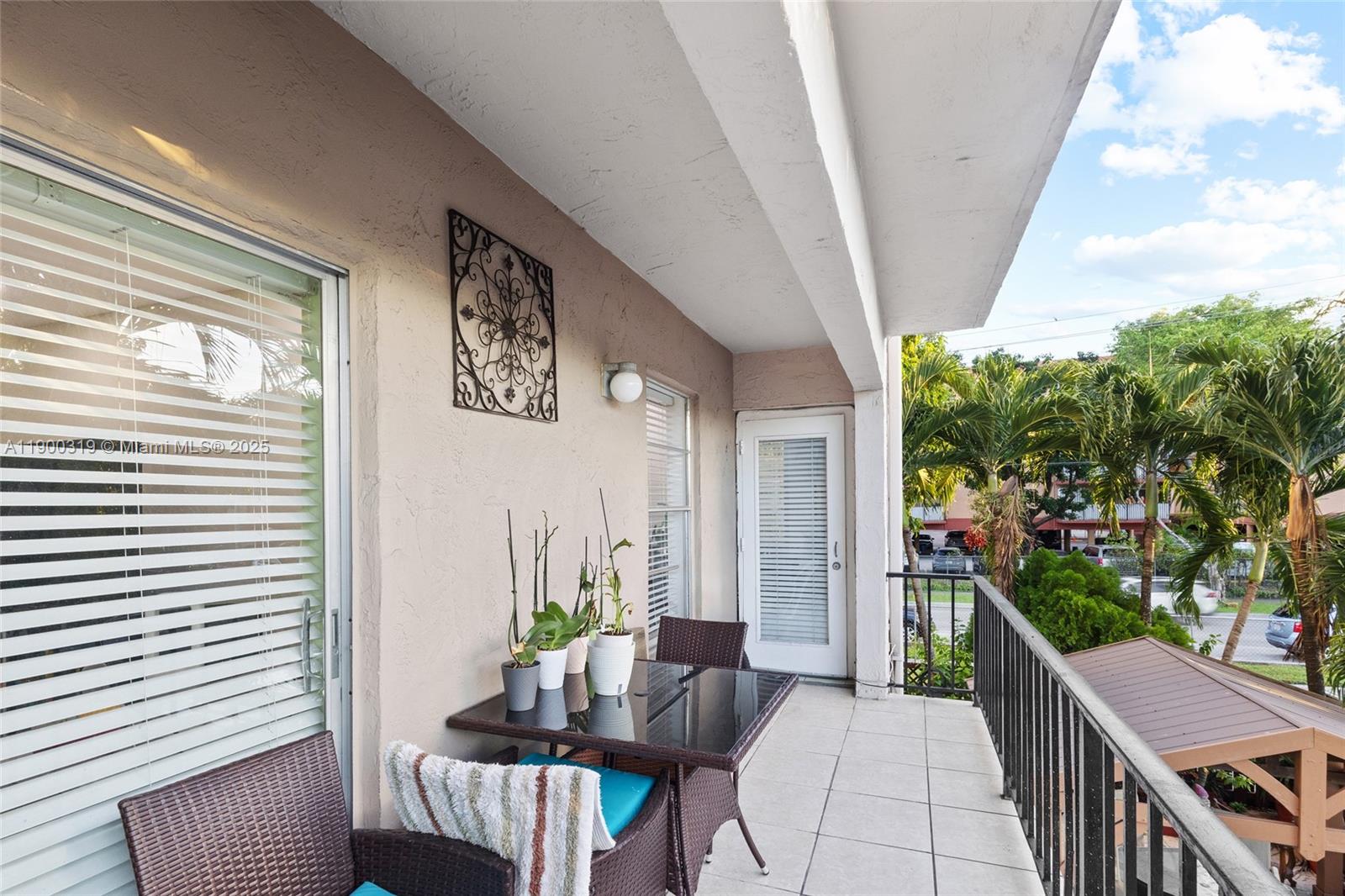 5665 West 20th Avenue, Unit 212 Hialeah, FL 33012 - Photo 22 of 38 a outdoor space with furniture