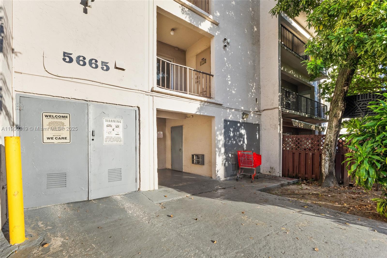 5665 West 20th Avenue, Unit 212 Hialeah, FL 33012 - Photo 25 of 38 a view of a building with the street