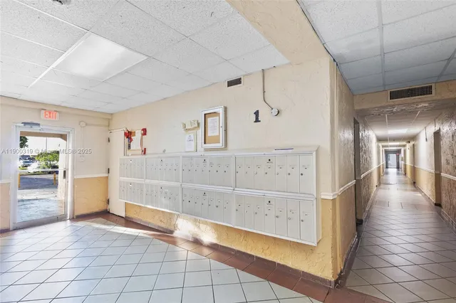 a view of kitchen with cabinet and stairs