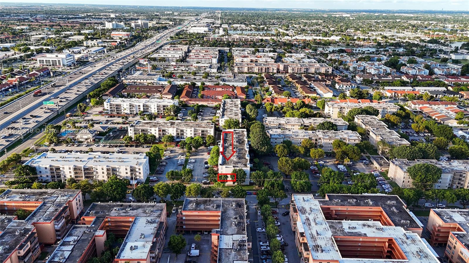 5665 West 20th Avenue, Unit 212 Hialeah, FL 33012 - Photo 37 of 38 an aerial view of a city with lots of residential buildings