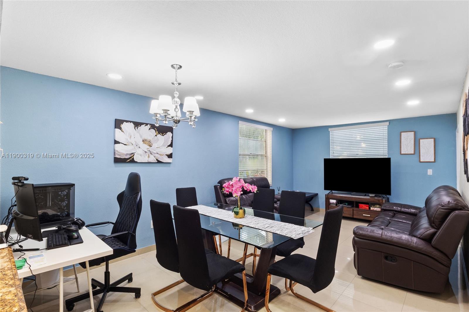 5665 West 20th Avenue, Unit 212 Hialeah, FL 33012 - Photo 4 of 38 a view of a workspace with furniture