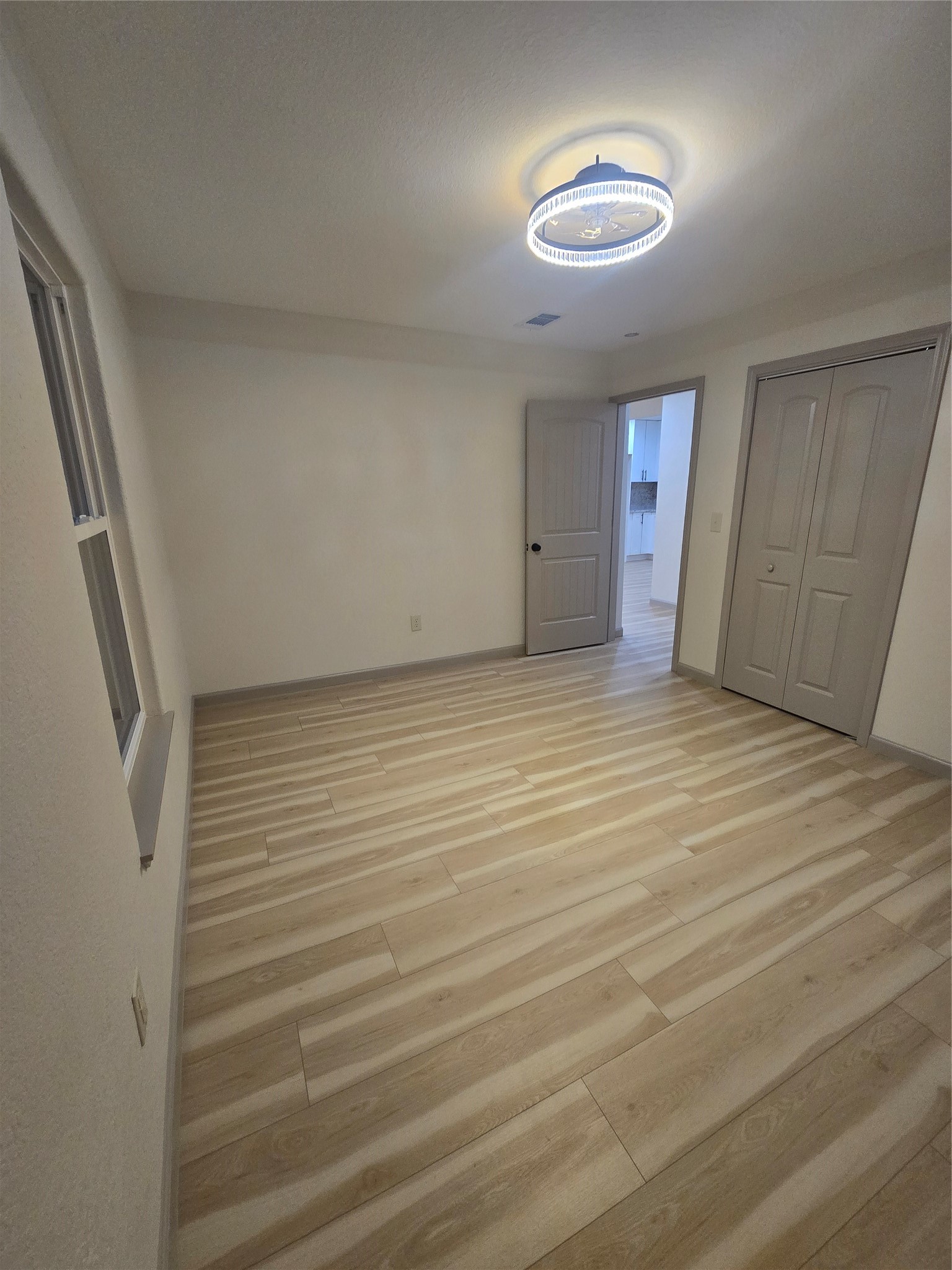 58 Hybiscus Court Lake Jackson, TX 77566 - Photo 12 of 21 a view of an empty room with a window