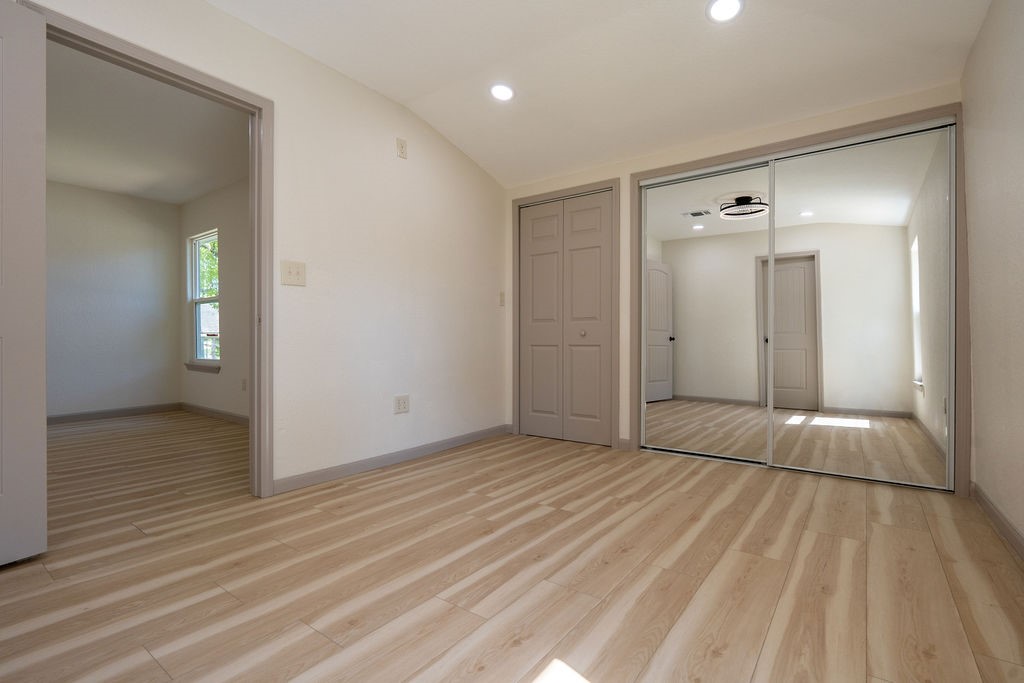 58 Hybiscus Court Lake Jackson, TX 77566 - Photo 10 of 21 wooden floor in an empty room