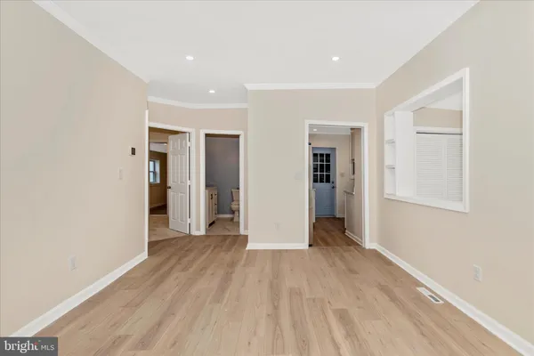 a kitchen with stainless steel appliances granite countertop a sink stove and microwave
