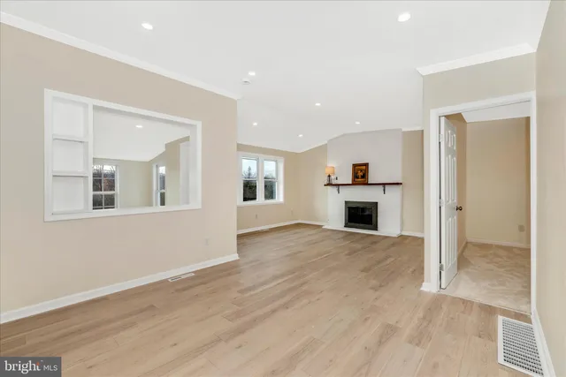 a kitchen with stainless steel appliances granite countertop a sink stove and microwave