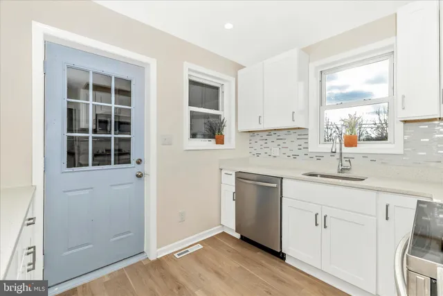 a bedroom with bed and window