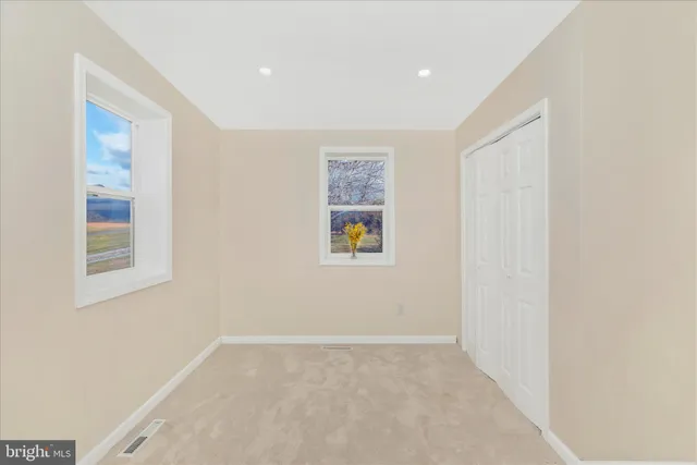 an empty room with a window