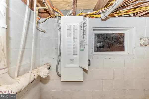 a view of yard with swimming pool and trees