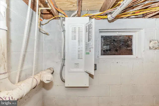 a view of yard with swimming pool and trees