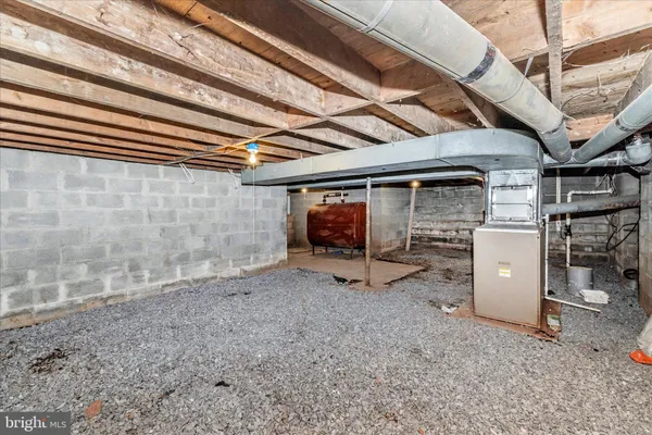a view of house with backyard space