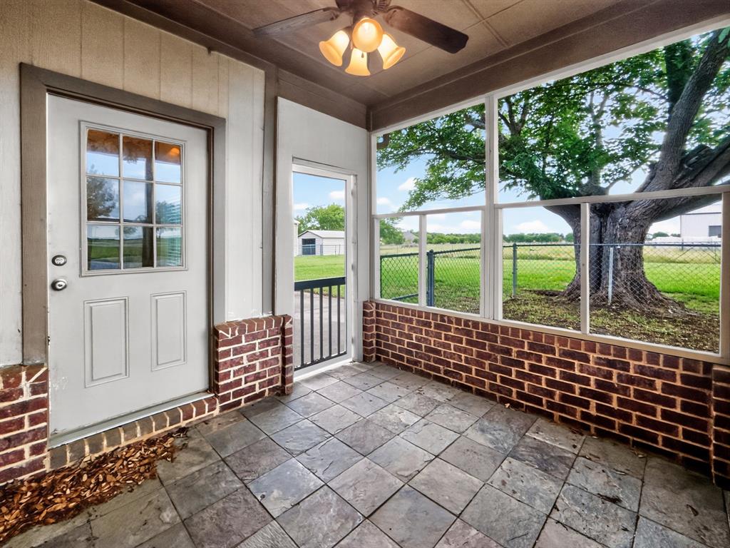 1255 Vineyard Road Gunter, TX 75058 - Photo 2 of 20 Screened-in sunroom to enjoy morning coffee!