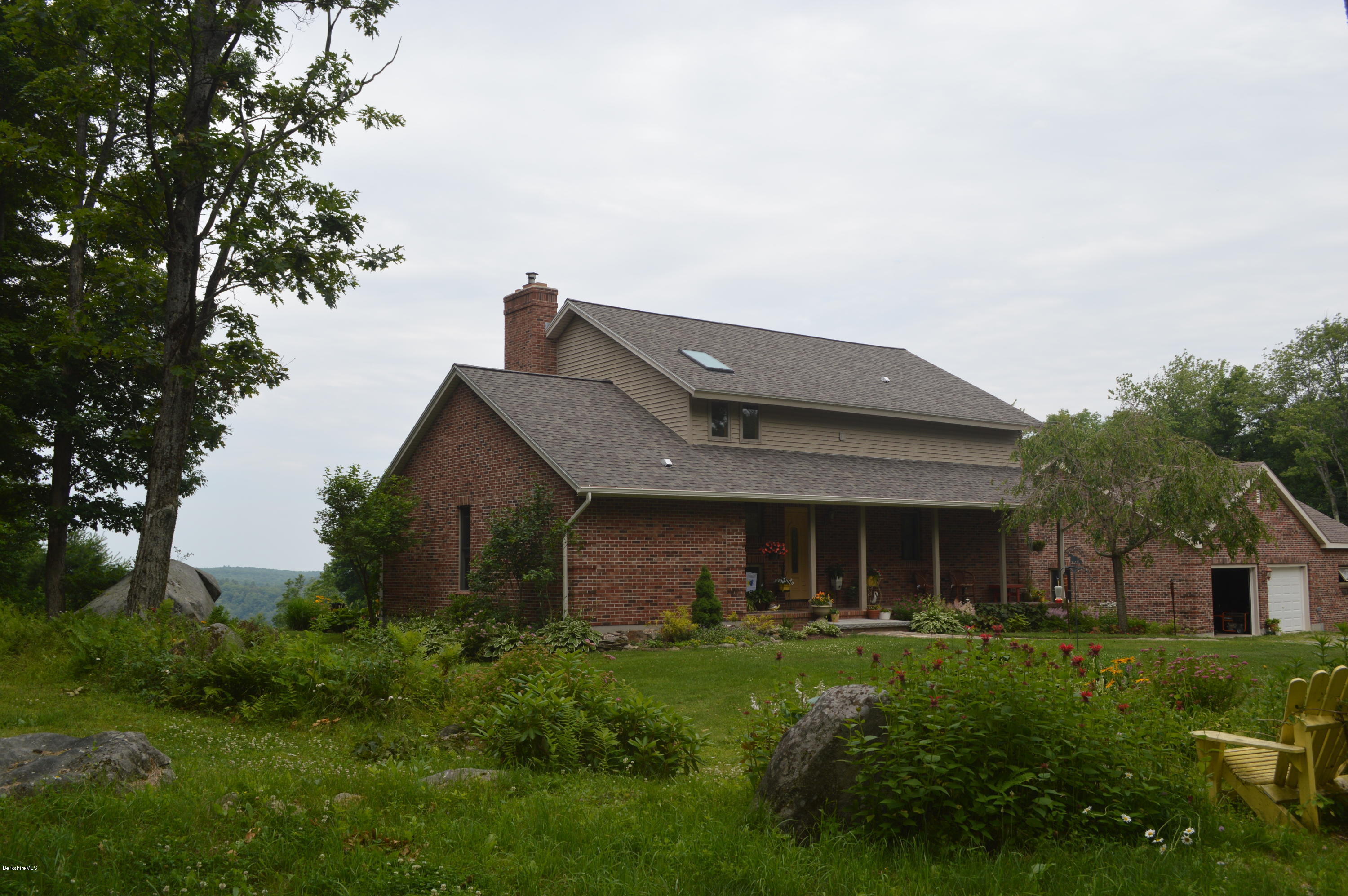 759 George Carter Road Becket, MA 01223 - Photo 1 of 56 a view of a house with a yard plants and large tree