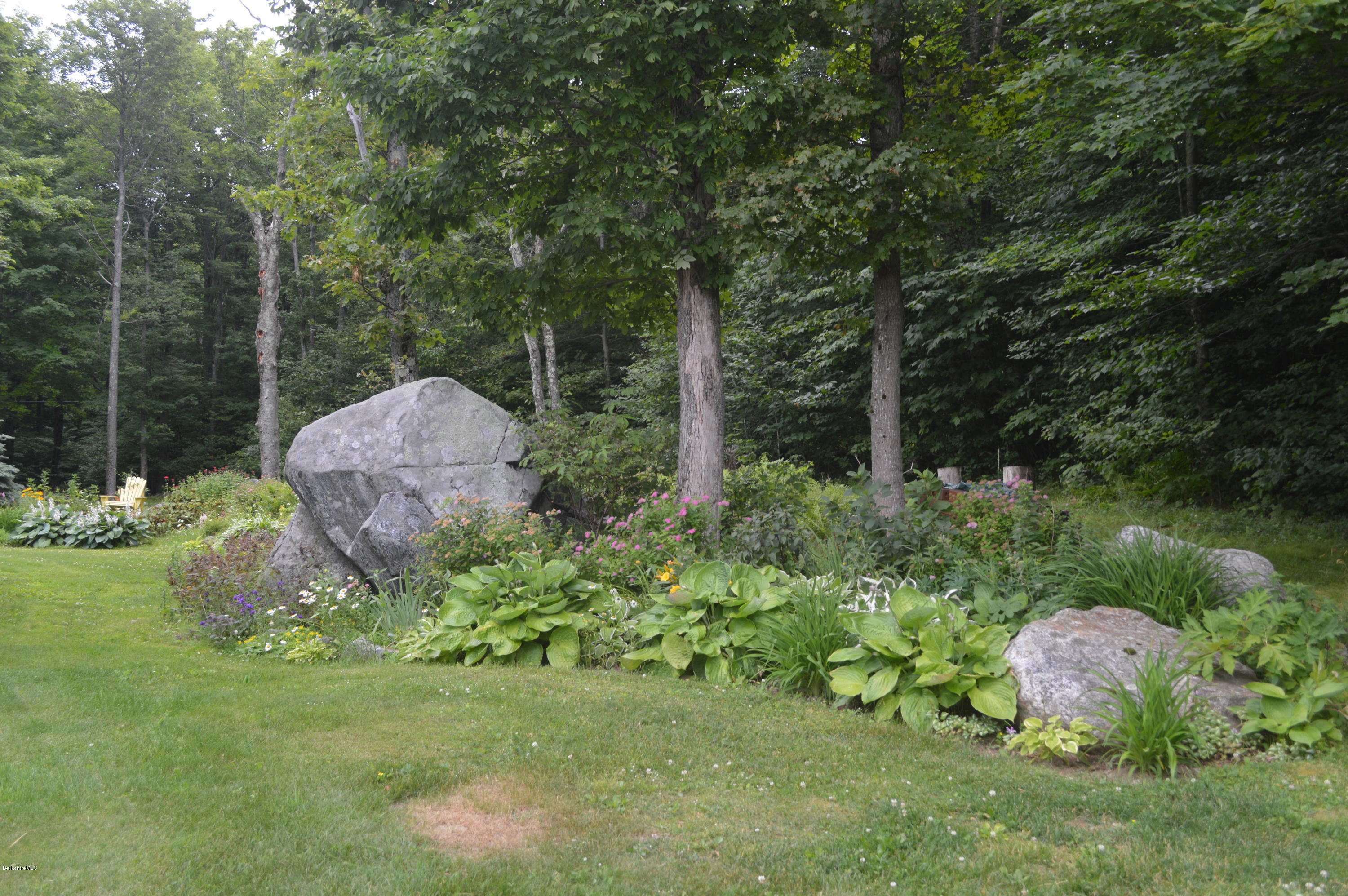 759 George Carter Road Becket, MA 01223 - Photo 43 of 56 a garden view with a pond