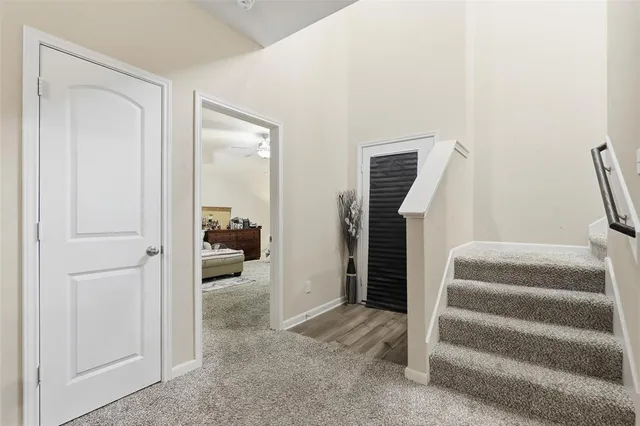 a view of a room that has a toilet and a window