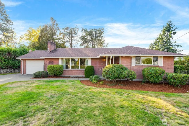 front view of a house and a yard