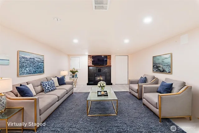 an empty room with a fireplace