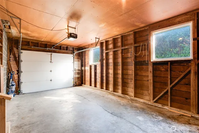 a front view of a building with garden