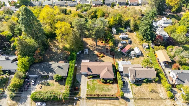a view of residential houses with swimming pool