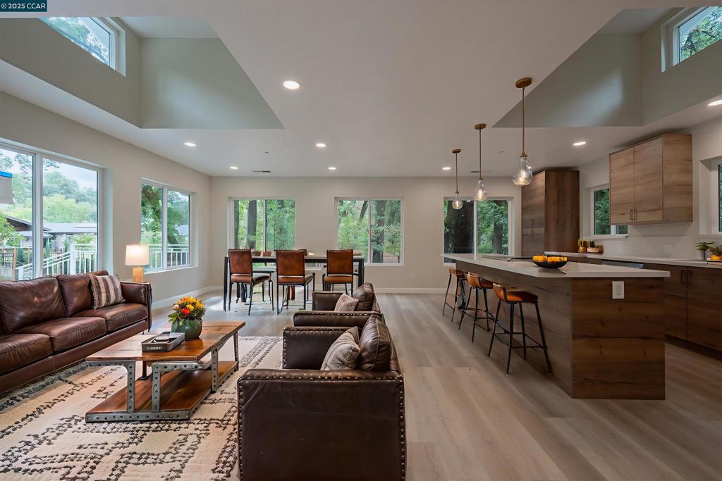 1244 Stone Valley Road Alamo, CA 94507 - Photo 7 of 20 a living room with furniture and a large window