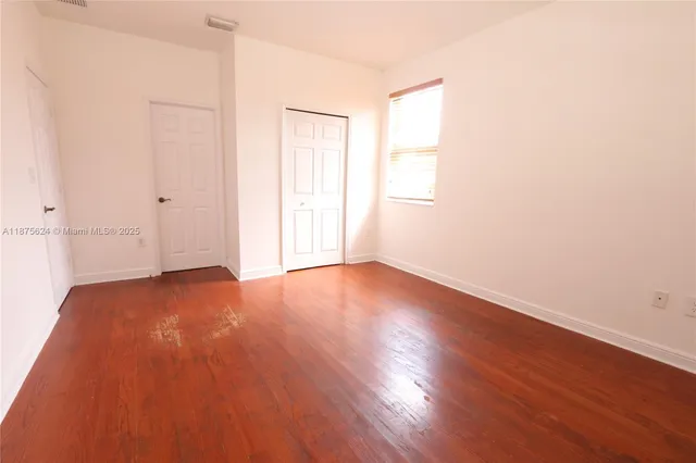 a bathroom with a sink a vanity and a mirror