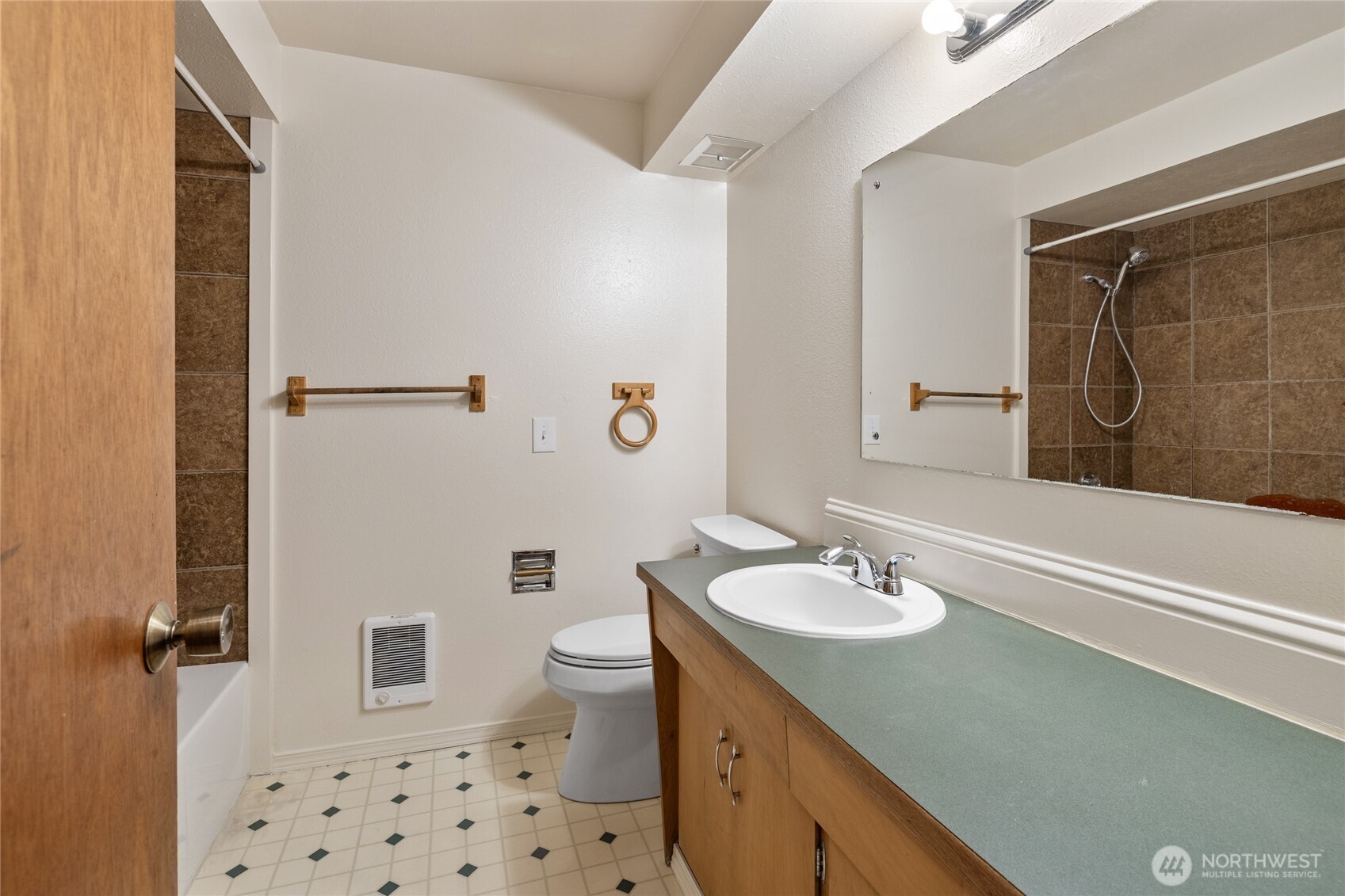 2517 Howard Avenue Everett, WA 98203 - Photo 16 of 32 a bathroom with a sink a toilet and shower