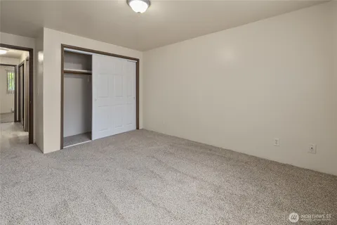 an empty room with closet