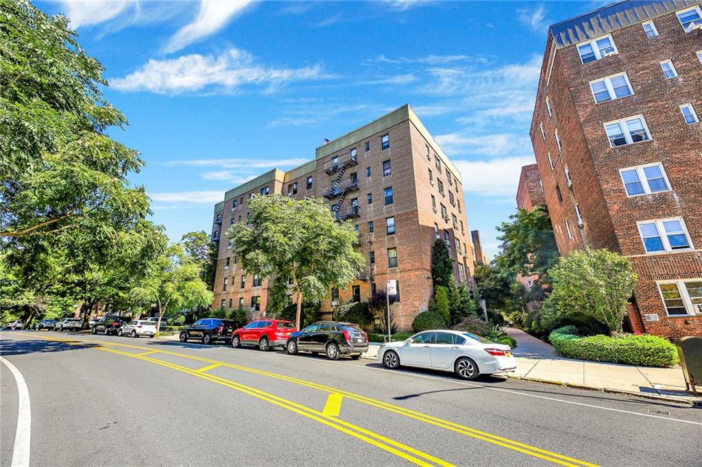 7259 Shore Road, Unit 2G Brooklyn, NY 11209 - Photo 15 of 16 a cars parked on the side of a street