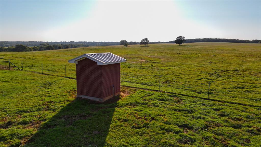 675 Hundley Road Montague, TX 76251 - Photo 13 of 37 a view of a lake with outdoor space