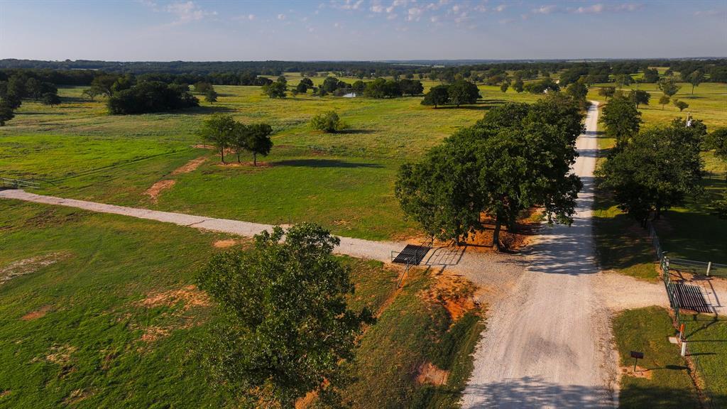 675 Hundley Road Montague, TX 76251 - Photo 32 of 37 a view of a lake with houses in the back