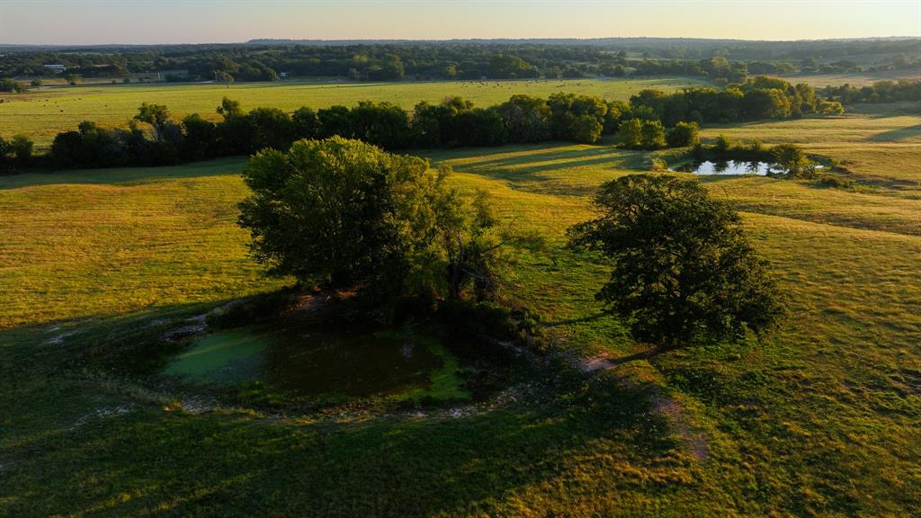 675 Hundley Road Montague, TX 76251 - Photo 9 of 37 a view of a lake with houses in the back
