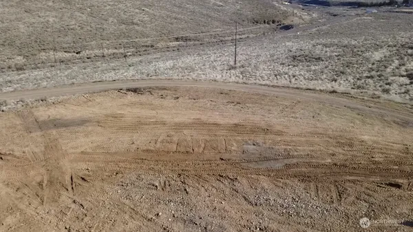 a view of wooden floor in a bathroom