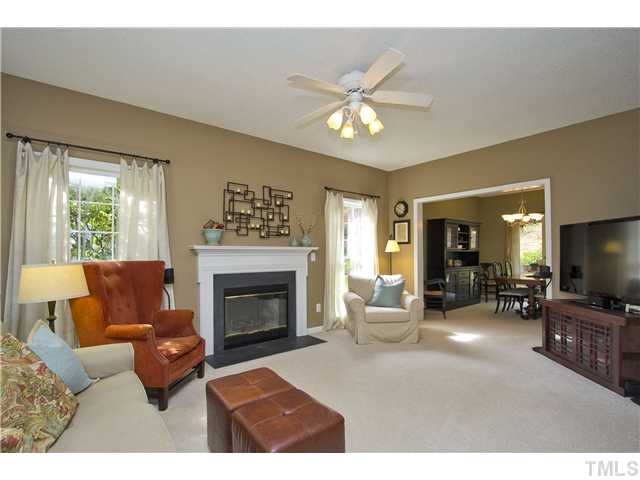 315 Catlin Road Cary, NC 27519 - Photo 10 of 25 Large family room with wood burning fireplace