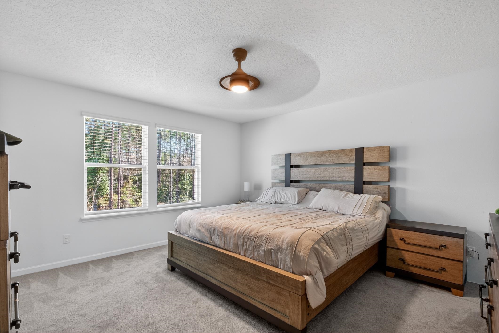 177 White Rabbit Run St. Augustine, FL 32092 - Photo 25 of 51 Bedroom featuring carpet, a textured ceiling, and ceiling fan