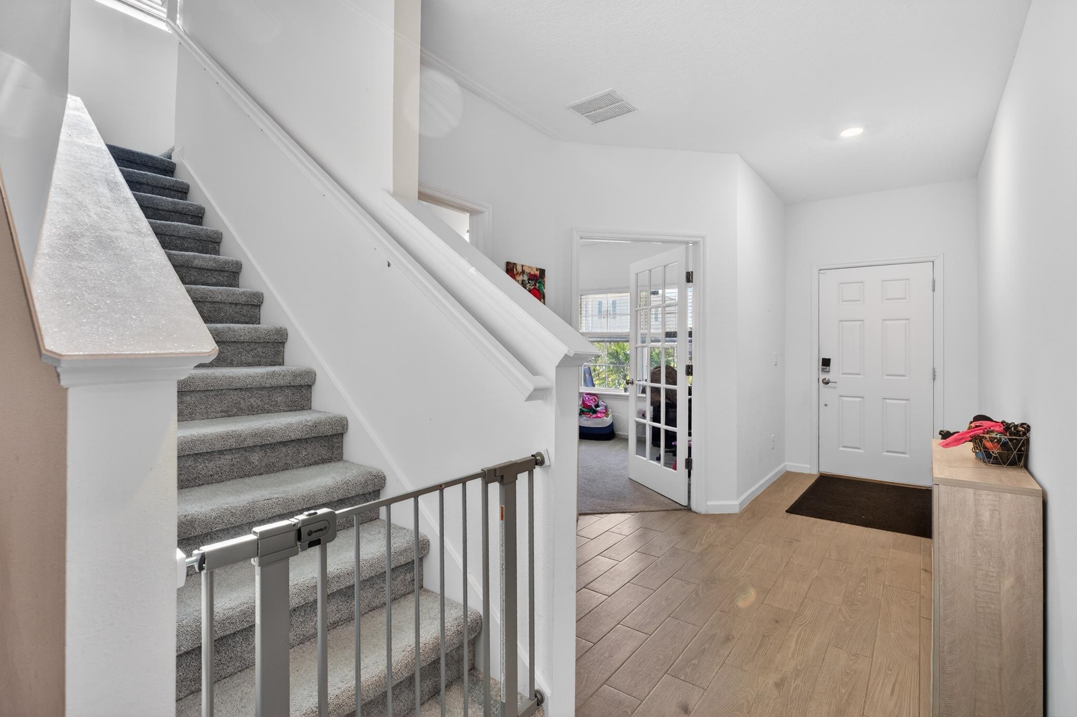 177 White Rabbit Run St. Augustine, FL 32092 - Photo 26 of 53 Foyer featuring light wood finished floors, stairway, and recessed lighting